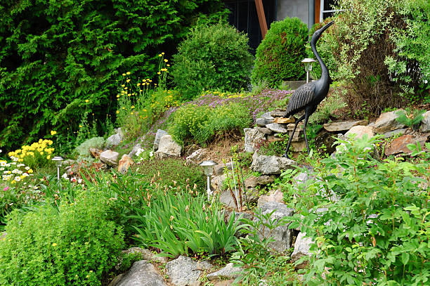 istock rock garden with heron steel decoration 493244647