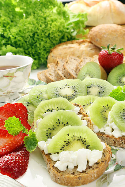 istock Sandwich with white cottage cheese and fruits 493245085