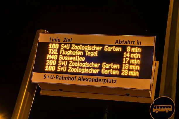 display at busstation in berlin by night