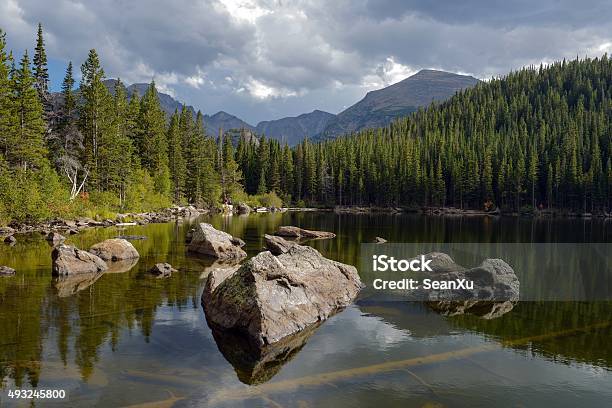 Storm Coming At Rocky Alpine Lake Stock Photo - Download Image Now - Colorado, Dark, Forest