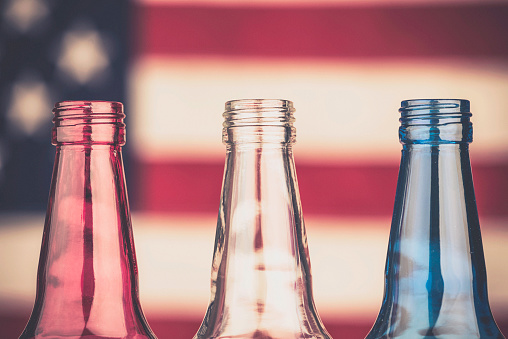 Patriotic red, white and blue beer bottles. July 4th party.