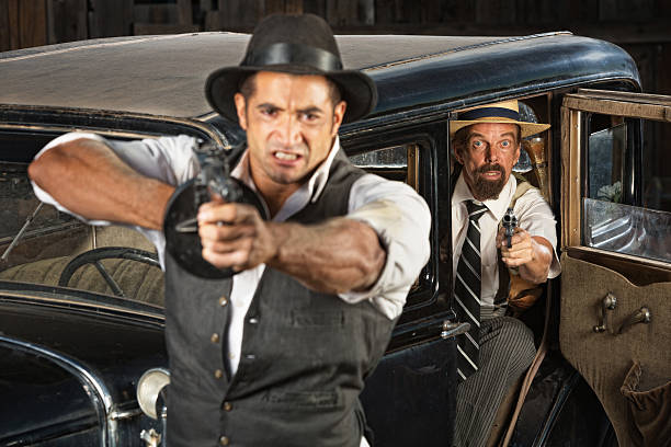 istock Angry 1920s Era Gangsters with Guns 493246783