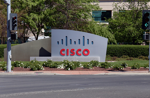 San Jose, CA, USA – March 18, 2014: The Cisco Systems World Headquarters located in San Jose. Cisco Systems is an American multinational corporation that designs, manufactures and sells computer networking equipment.