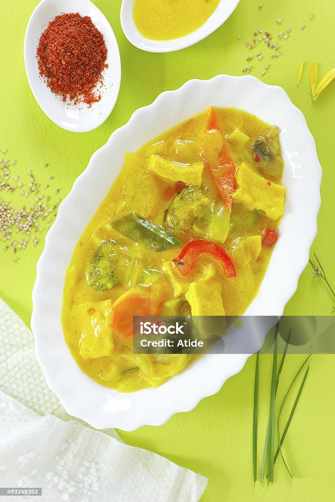 Vegetable curry Yellow vegetable curry with tofu, carrot and pepper. Curry - Meal Stock Photo