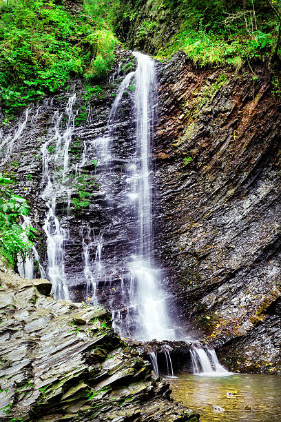 istock Falls among the black rocks 493249654