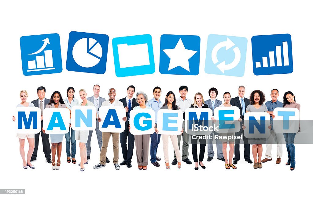 Group Of Business People Holding The Word Management And Related Group Of Business People Holding The Word Management And Related Symbols Above 2015 Stock Photo