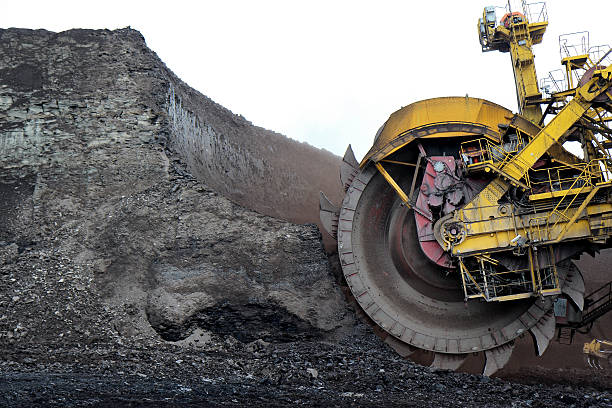 detail of huge coal excavator mining wheel stock photo