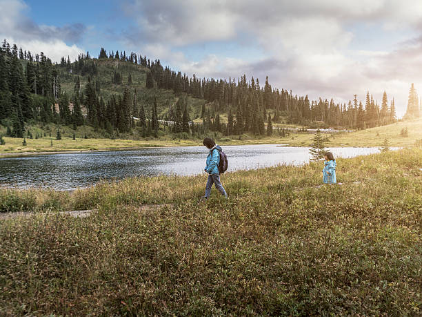 istock mother hiking with daughter at MT.Rainier 493250718
