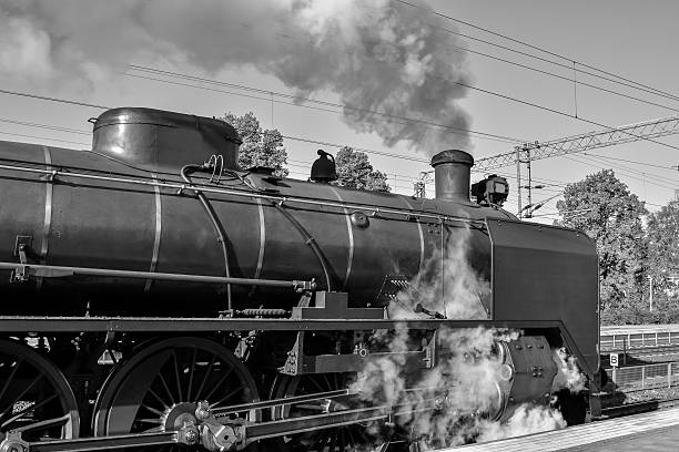 istock Steam locomotive and train 493269250