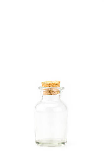 istock Glass bottle with cork cover isolated on white background 493271272