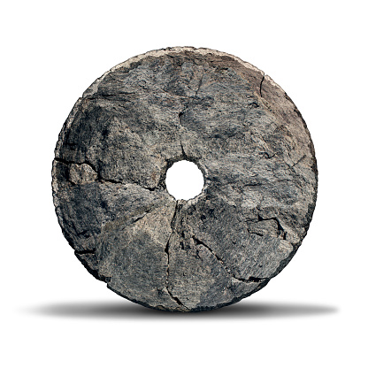 Stone wheel object as an early invention of the prehistoric era and ancient symbol of technology and innovation designed by a caveman on a white background.