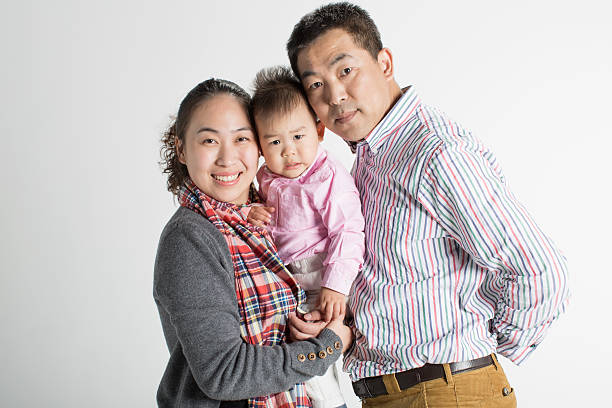 istock happy chinese family 493272556