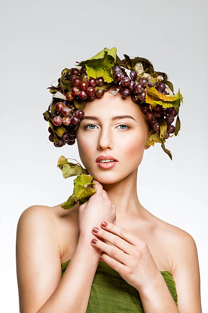 istock The girl with grapes 493275134