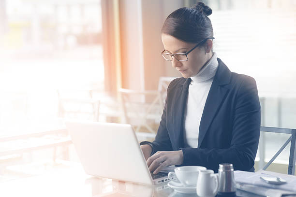 istock Confident businesswoman working on a laptop 493276198