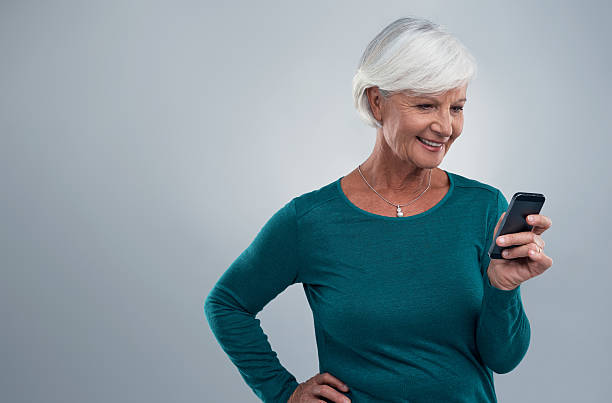 istock Loving her new phone 493277824