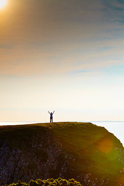 Rhossili bay  Woman with hands up  rhossili bay stock pictures, royalty-free photos & images