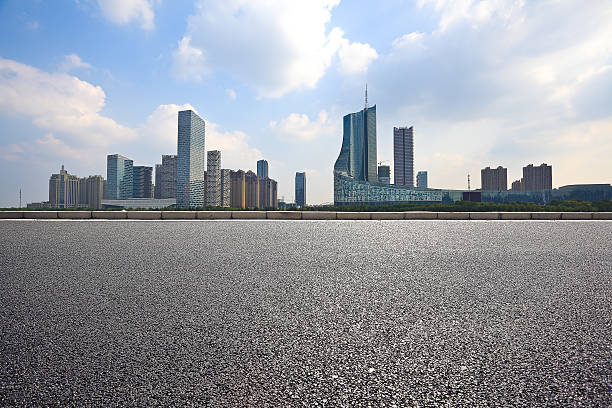 istock Empty road floor with City building background 493279330