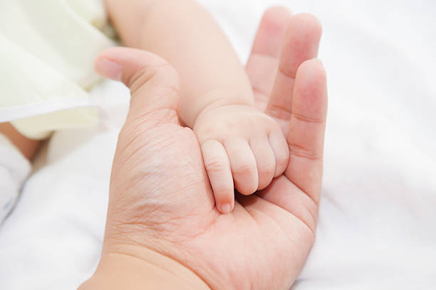 istock Hand of baby 493279704