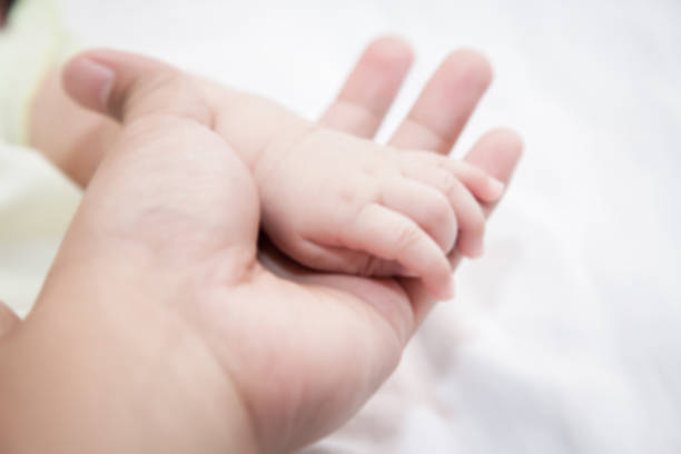 istock Hand of baby 493280306