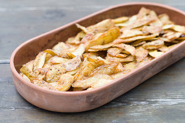 Crispy potato skins in crockery