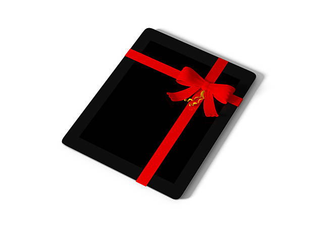 istock tablet wrapped with color ribbon 493282782