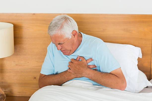 istock Senior man suffering with heart pain 493283141