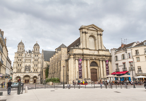 Dijon, France - August 16, 2015: Place du Théâtre - Place of Theatre is a square in the city center of Dijon, in the conservation area, subscribed since July 4, 2015 World Heritage of UNESCO. The Bibliotheque -  Consecrated in 1619, the chapel respects the architectural rules of the order, issued by Martellange. Fitted between 1654 and 1657, the Hall of Currencies hosts a first library designed for fathers.