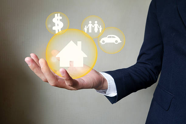 istock Businessman holding protect house , insurance concept 493283710
