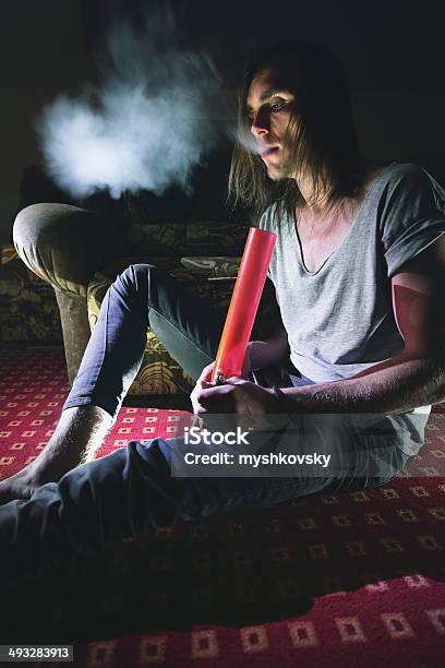 Addict Smokes Marijuana Stock Photo - Download Image Now - Bong, Cannabis Plant, Smoke - Physical Structure