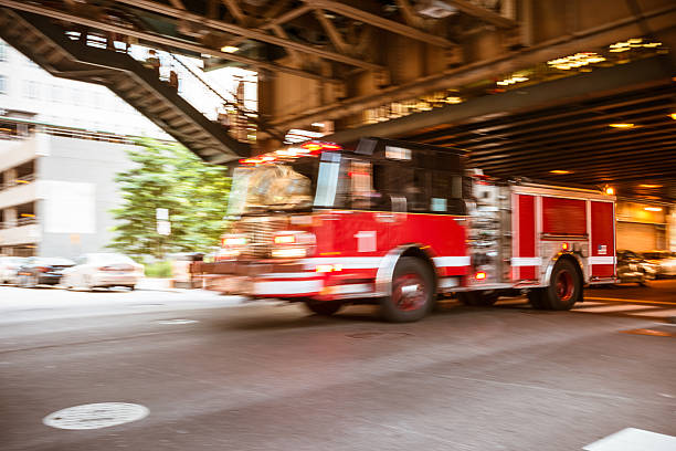istock fire department truck motion blur 493284993