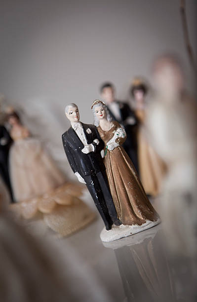 istock Antique bride and groom cake toppers. 493285253