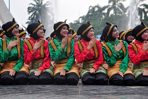 Jakarta, Indonesia - April 19, 2015: Saman dance performances at Taman Mini Indonesia Indah, Jakarta, Indonesia