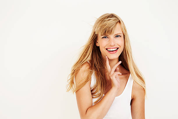 istock Happy young blond woman in studio 493304318