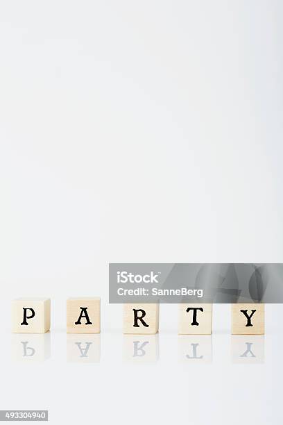 Scrabble Tiles Spell Party In White Studio Stock Photo - Download Image Now - Letter - Document, 2015, Celebration