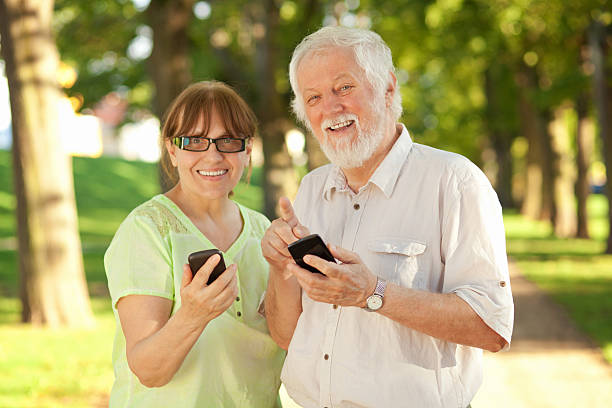 istock Seniors and smart phones 493305594