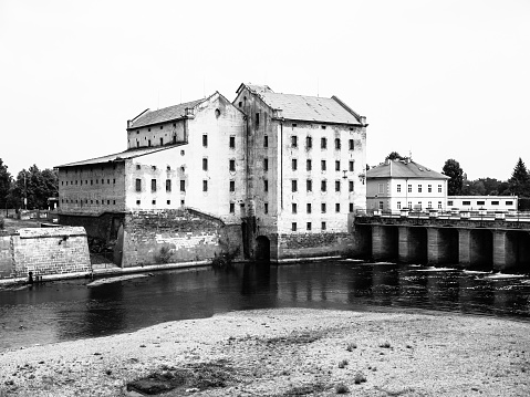 Old mill at Ohre river in Terezin, Czech Republic. Black and white image