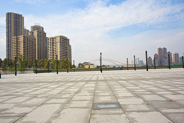 istock Empty marble floor with city building background 493308856