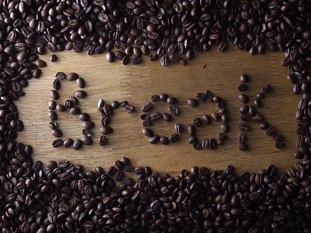 istock Coffee beans and word break spelled with the coffee beans 493309982