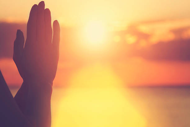 istock Young woman practicing yoga on the beach. 493311312