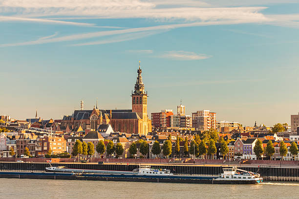 The Dutch city of Nijmegen during sunset The Dutch city of Nijmegen during sunset with the river Waal in front gelderland photos stock pictures, royalty-free photos & images