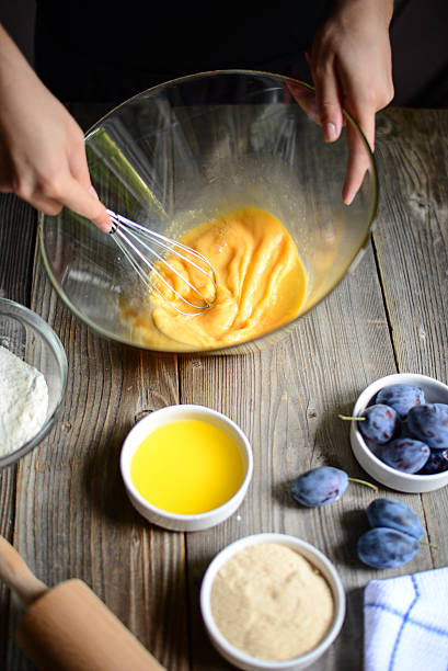 istock Woman prepare the eggs for butter and flour 493317164