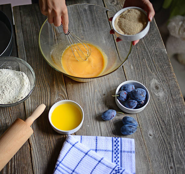 istock Woman prepare the eggs for butter and flour 493317266