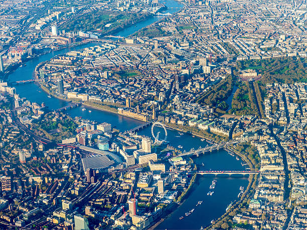 Aerial view over Westminster and River Thames, London, England, UK Looking down over Westminster including landmarks such as the Houses of Parliament, Buckingham Palace and the River Thames. London, England, UK. buckingham palace photos stock pictures, royalty-free photos & images