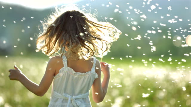 SUPER SLO-MO Little Girl Surrounded With Dandelions