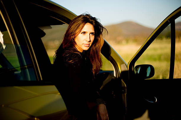 istock Young beautiful woman in the car 493319285