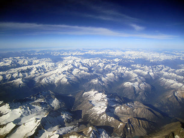 istock Aerial view of snow covered mountains in Canada 493320245