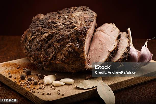 Sliced Cold Boiled Pork With Garlic Bay Leaves And Spices Stock Photo - Download Image Now