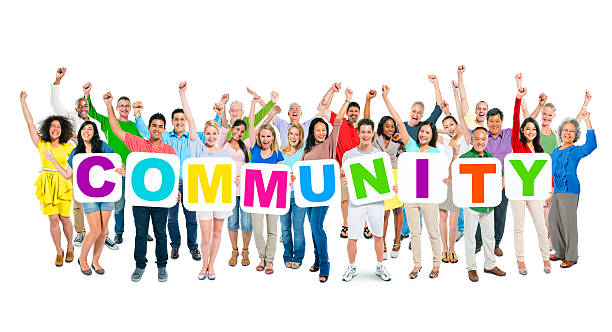istock Large Group of Diverse People Holding Word Community 493325459