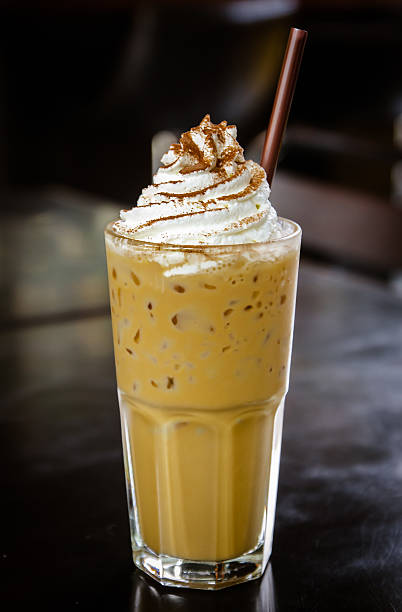 istock Iced coffee with whipped cream on the table. 493325675