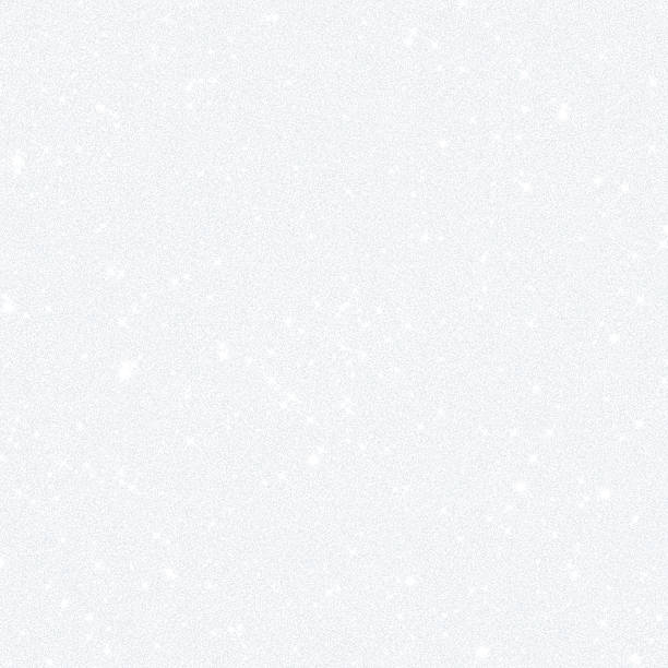 istock White sparkling texture of snowflakes 493330922